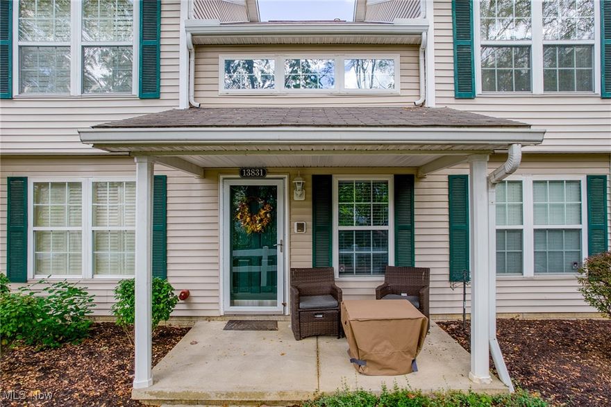 This beautifully remodeled and immaculate 2-bedroom, 2.5-bath townhome features an attached 1-car garage and a cozy front porch. It boasts a modern open floor plan that connects the living room, kitchen, and dining area, along with convenient first-floor laundry and a half bathroom. Since 2018, the home has undergone numerous upgrades, including LifeProof vinyl flooring throughout, new tile  in the bathrooms . A stunning kitchen with sparkling quartz countertops, stylish backsplash, gas stove, and a microwave. Fresh paint, & new light fixtures. Recent updates also include a new hot water tank installed in 2021, smart home features like an Ecobee thermostat. In 2023, a high-efficiency 60,000 BTU furnace and a 2-ton 16 SEER AC unit were installed, complete with a 10-year warranty & regular maintenance checks. A Ring alarm system was added for extra security, making this townhome a perfect blend of comfort and modern living. This is a must-see!