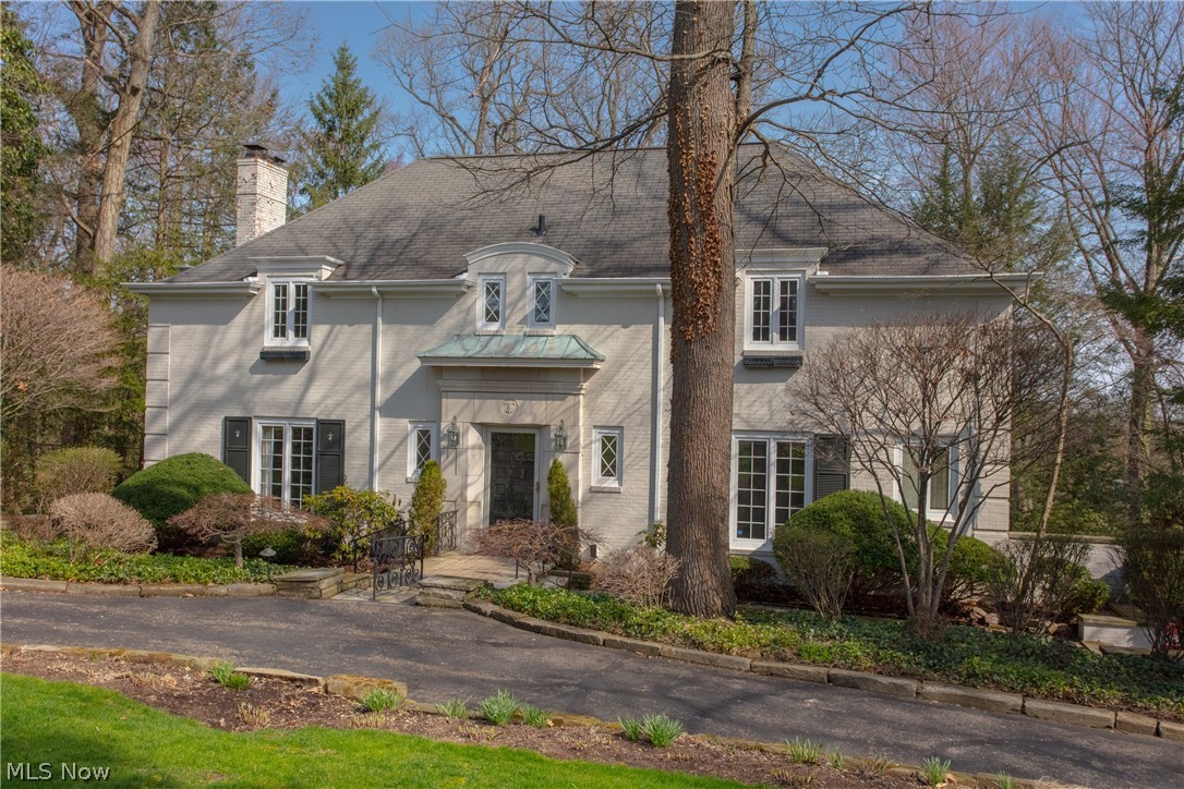 Beautiful traditional colonial on almost an acre in Fairlawn Heights! Walk in through the front door, and you'll notice this home is filled with elegance and character throughout. Majority of home has new paint and carpet. Large living room w/gas fireplace leads into four season sunroom, which is surrounded by windows and gleam with natural light. This space also has a gas fireplace and is the perfect spot for gatherings, or to enjoy the scenic view of the backyard. Library/study area has built-in bookcases. Also on the main floor dining room, kitchen, laundry room, and half bathroom. Heading up the main staircase, you will find the master bedroom w/ en suite and walk-in closet. En suite has jetted soaking tub, marble flooring and double sink vanity. Two secondary bedrooms and a full bathroom within this section of the second level. A fourth bedroom w/bathroom near back staircase. Walk out basement. Plenty of storage and closet space in this home! TOP OF THE LINE water system, Kinetico
