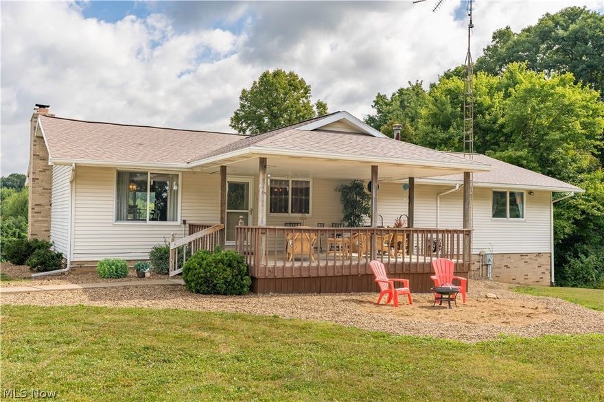 Updated ranch is country living at its best on 3.31 acres with a 6 car garage (29x70) and 12x16 storage shed.  A spacious living room with brick wood burning fireplace and large windows overlooking scenic country views is open to the spacious dining room.  A custom oak kitchen with island has plenty of storage and the first floor laundry.  A large main bathroom has dual sinks, and tub/shower combo.  Down the hall are two bedrooms with generous closets and the large master suite with ensuite dual sinks and walk-in closet.  The lower level features an additional 1500 sq ft living suite with separate entrance, dining/kitchen, large living room with fireplace, full bath with shower, and utility room with laundry hookups.  This home also comes with FREE gas...call to schedule your showing today!
