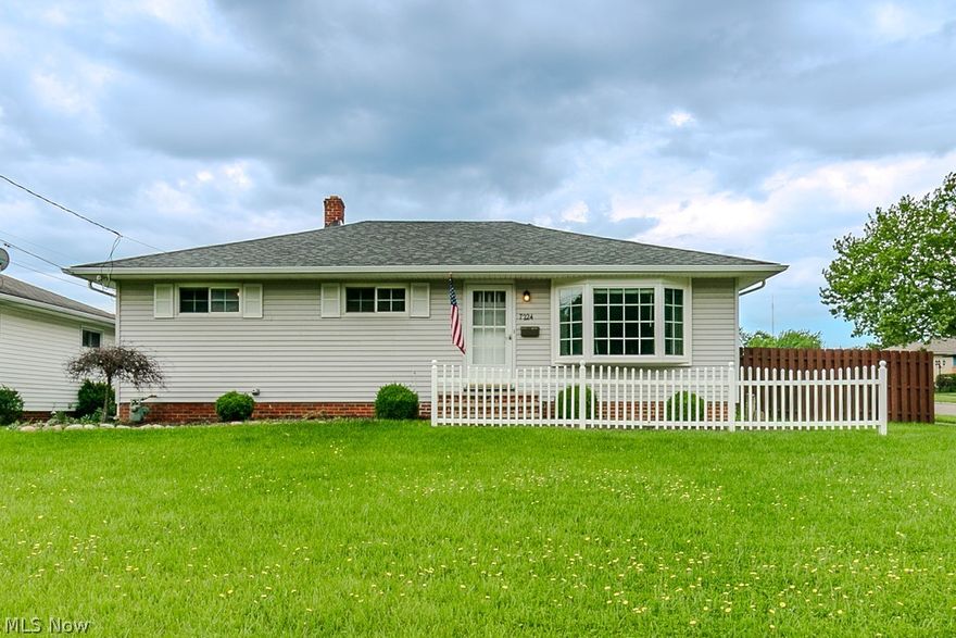 Right in the heart of Parma, this well-maintained, move-in ready ranch sits on a spacious corner lot and offers comfort, updates, and great indoor-outdoor living. Step inside to a large living room filled with natural light from the beautiful bay window, flowing easily into the dining room for everyday meals or entertaining. From the dining area, sliding doors lead to a patio with a pergola that will remain, overlooking an oversized backyard with plenty of room to play, relax, or gather around the fire pit, all enhanced by a privacy fence and a paver walkway leading to the garage. The updated kitchen is both stylish and functional, featuring white cabinetry, stainless steel appliances, generous cabinet space, and a convenient breakfast bar. All three bedrooms are nicely sized with ample closet space, including one with a trendy accent wall design and another with built-in storage shelving. The full bath has also been updated with a shower surround and plenty of storage. The lower level expands the living space with a finished carpeted recreation room, plus a bonus room ideal for a home office, workout room, media room, or whatever best suits your needs. You’ll also find a laundry area with sink and an additional room perfect for storage or a workshop. Major updates include a newer roof and hot water tank, both completed in 2024. With its great location, updated features, spacious yard, and move-in ready appeal, this Parma ranch is one you won’t want to miss!