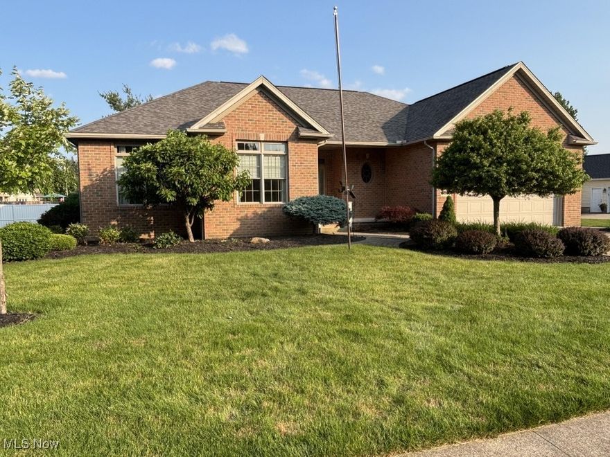 Exciting real estate opportunity! Nice Ranch Home in North Canton, 4 Bedrooms, 3 Full Baths, Nice .48-Acre Lot, Attached 2 Car Garage, Full Finished Basement, Modern Open Concept with security system. Good Location in Washington Square. Built in 2004 this home offers 2,005 SF of living space, with 3 bedrooms and 2 full baths all on the main level. Open concept eat-in kitchen, cathedral ceilinged living room with gas fireplace, Master Suite has 2 closets with one being a large walk-in. A full bath with a walk-in shower, as well as access to large, covered  back porch. A full finished basement with extra high ceilings and great storage offers potential for additional living space + extra bedroom, dressing room and full bath. Concrete driveway to attached 2 car garage with side entrance. Solid home, Recent updates include a Furnace Unit in 2025.