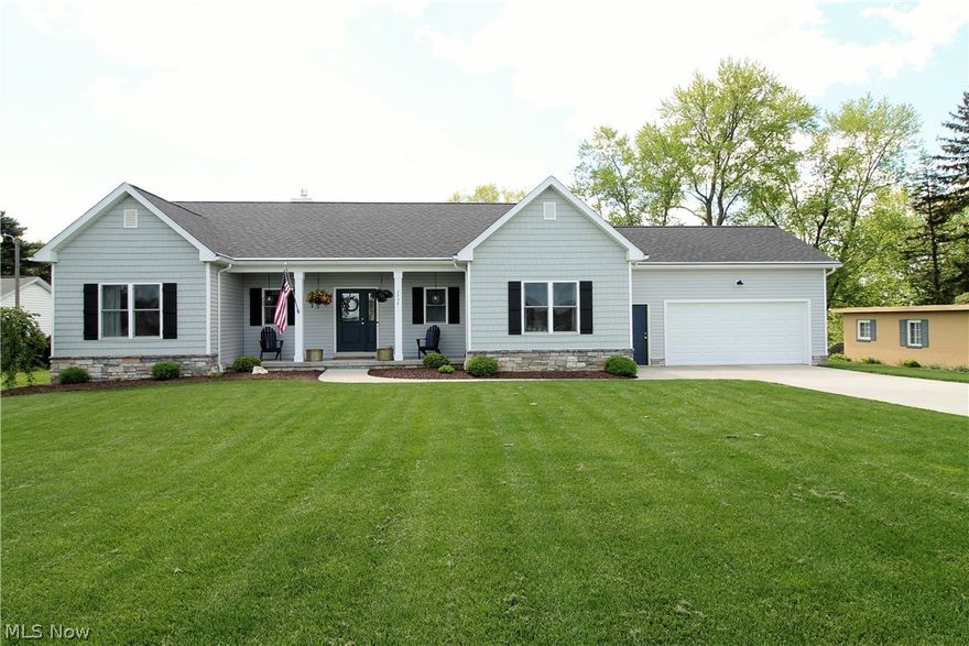 WOW! Welcome to this stunning three possible four bedroom, three full bath ranch home built in 2017 with a front porch for sitting outside and relaxing. As you enter the front door there is a large open foyer to the great room with high ceilings and a stone gas fireplace with mantle and windows to let the natural light to shine through. Open dining room has slider door to the Timber Tech Deck (2020) to sit out and relax overlooking the fabulous large backyard. The large bright, gorgeous modern kitchen which is the heart of this beautiful home offers soft close cabinets, Quartz counters, stainless steel appliances, vent hood, built in microwave, pantry, and a large island offering more counterspace and a great spot to gather around while cooking that fabulous meal. Master suite offers a full bathroom with his and her sinks/cabinets, floor to ceiling tiled shower stall and large walk in closet. There are two more large bedrooms that share the full hall bathroom all on the opposite side o