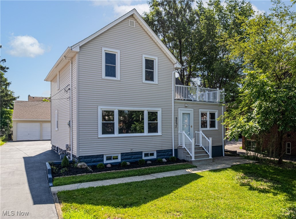 Can you imagine a home that suits any walk of life perfectly? Now you don’t have to—welcome to the pristinely renovated 6227 Ridge Road! This masterfully updated home is bursting with charm. BRAND NEW, BRAND NEW, BRAND NEW—flooring, fixtures, driveway, and more—every detail was curated for your comfort. The first floor boasts a stunning kitchen with marble-style granite countertops, backsplash and flooring with POPS of copper-brown, and sleek stainless steel appliances. From here, access a walk-in pantry with outlets and ventilation, a fully remodeled bath, and main-level laundry with pex piping and gas or electric dryer hookups. The open layout between dining room, living room, and foyer creates a warm, connected space. A main-floor bedroom adds convenient privacy and flexibility—your blank canvas with room for creativity. Upstairs, discover three enormous bedrooms. One side features a uniquely designed master suite with a private full bath, glowing multi-zone layout, and your own walk-out balcony for peaceful evenings or sunny mornings. On the other side, find three tandem rooms: a bedroom with vanity nook and dual closets, a versatile middle space (office, nursery, closet—you decide!), and a final secluded retreat. Although located on Ridge Road in Parma, the home sits 70+ feet back, offering privacy, safety, and serenity. And yes—that driveway is brand new, leading to a garage that comfortably fits three cars, with a loft above just waiting to be transformed into a hobby room, lounge, or studio. Near three major highways and endless shopping, this is the perfect blend of comfort, style, and convenience. Ask your Realtor for the updates list in the supplements and schedule your private tour today!