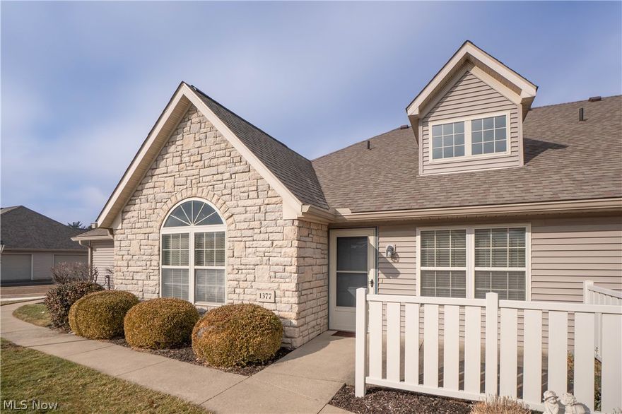 Enjoy easy one-floor living in this well-maintained 2-bedroom, 2 full bath ranch condo located in the desirable Abbey Glen community in Massillon. Offering 1,208 square feet and a 2-car attached garage, this home combines comfort, convenience, and a fantastic location close to Route 21, shopping, restaurants, downtown Massillon, and Sippo Park.

The open floor plan seamlessly connects the kitchen, dining area, and great room—perfect for everyday living and entertaining. The spacious great room features soaring ceilings and Cape Cod-style windows that flood the space with natural light, creating an airy and inviting atmosphere.
The fully applianced eat-in kitchen includes an electric range, over-the-range microwave, dishwasher, refrigerator, pantry, recessed lighting, and a breakfast bar for additional seating. Just off the main living space, you’ll find a convenient first-floor laundry room with washer and dryer included.

The primary suite offers a vaulted ceiling, ceiling fan, generous walk-in closet, and a private full bath with shower and linen closet. The second bedroom also features a walk-in closet, with easy access to the second full bath complete with tub and updated toilets in both bathrooms.

Additional highlights include a brand-new roof (2025), newer hot water tank, central air, forced air gas heat, built-in storage shelving in the garage, and a private concrete front patio—ideal for relaxing outdoors. The monthly association fee covers landscaping, snow removal, trash, and water, offering low-maintenance living at its best