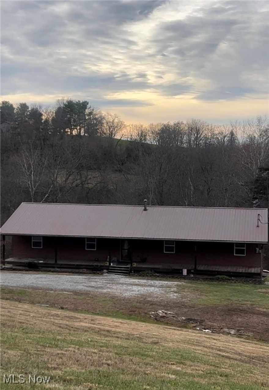 This 4 Bedroom, 2 Full Bath, Ranch Style home with full unfinished basement is located in the Warren School District, this home is sitting on a 2.92 Acre lot with Beautiful views, private drive, city water and septic. The home has propane heat and central air and a bonus back up secondary heating system connected to the duct work. The home boast a large Kitchen and Living Room with French doors, all one level living, home also has a 72ft x 8ft  covered front porch. Home comes with a 1 Year Home Warranty.