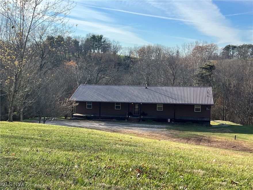 MOTIVATED SELLERS! This 4 Bedroom, 2 Full Bath, Ranch Style home with full unfinished basement is located in the Warren School District, this home is sitting on a 2.92 Acre lot with Beautiful views, private drive, city water and septic. The home has propane heat and central air and a bonus back up secondary heating system connected to the duct work. The home boast a large Kitchen and Living Room with French doors, all one level living, home also has a 72ft x 8ft  covered front porch. Home comes with a 1 Year Home Warranty.