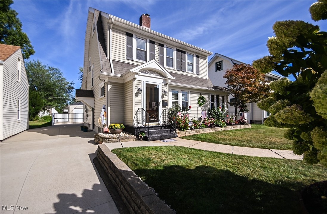 Well maintained and nicely updated, move in ready Harter Heights colonial, across the street from Harter Elementary School. Charming vestibule with ceramic tile floor and beadboard ceiling. Hard wood floor entry opens to the cozy living room that features a stone fireplace, a ceiling fan and is carpeted. There is an office/family room with a wall fireplace on the first floor, that could be another bedroom. A sitting room on the main floor with a closet could be used as a fourth bedroom. The kitchen has been updated offering quartz countertops, stone and glass backsplash, white shaker style cabinetry, a pantry, and is fully applianced. The adjacent dining room gives access to the covered back porch, and fenced back yard. The first floor updated full bathroom also offers a laundry. The second floor has three bedrooms and a spacious updated full bathroom. Immaculate yard and landscaping, a fenced back yard and a two car detached garage complete the outdoor space.
