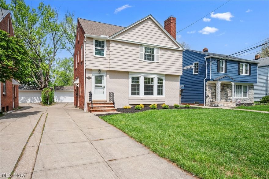 Fully renovated and ready to impress, this 4-bed, 3.5-bath Shaker Heights home is the one you've been waiting for. Prime location on the border of Shaker Heights and University Heights featuring beautiful new landscaping. Fully refinished hardwood floors and recessed lighting flow throughout all 2,080 square feet (and that’s not counting the basement!). The chef's kitchen features quartz counters, solid wood cabinets, center island, dual sinks, and two dishwashers — built for the way people actually live. The transformed bathrooms are a standout: a 2nd floor spa-inspired full bath with tub, glass block window, and backlit LED mirror; ensuite sleek second full bath with subway tile shower; a third full bath with tub in the private upper suite; and a chic half bath with  warm wood shelving on the first level. A dramatic spiral staircase leads to a stunning vaulted upper-level suite — your own private retreat. The refinished basement includes recessed lighting and a sleek epoxy floor laundry/systems area. Out back, a large deck is ready for summer entertaining, overlooking a generous, open yard with plenty of room to spread out. Renovated top to bottom including replacement thermal windows, and alarm system. Nothing to do but move in and start living.