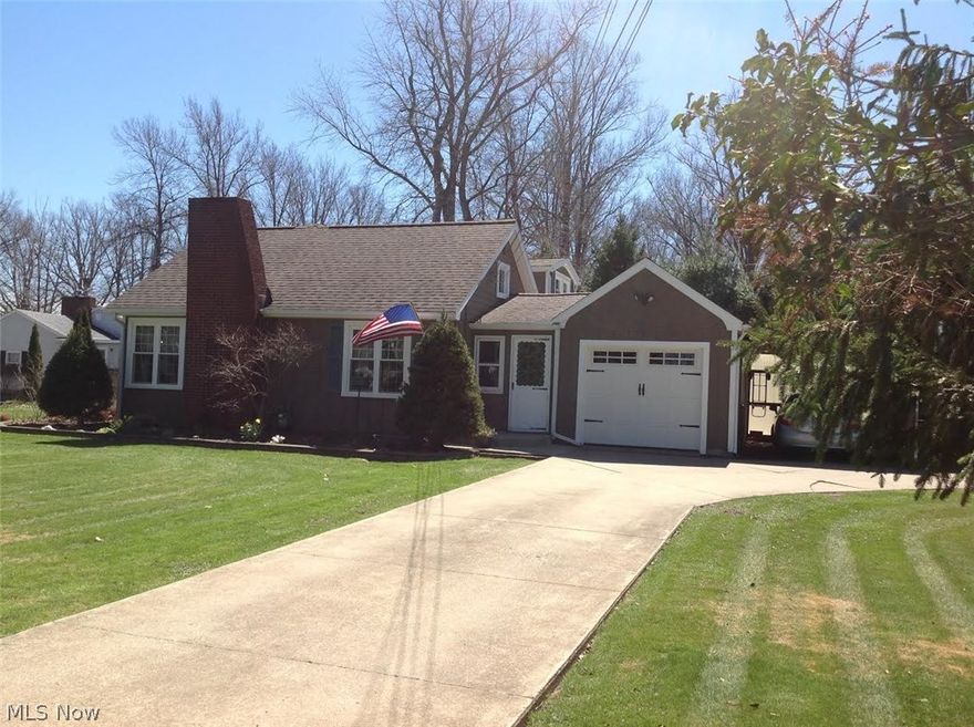 Move right into this lovely, updated Cape Cod with first floor master bedroom and bathroom; gorgeous new modern kitchen; large living room with fireplace and dining area; extra office/computer room. First floor Family room can be a 4th bedroom if needed...lots of storage in this one! 1 car att. garage, plus carport. Large, well manicured, corner lot with patio and outbuilding. This one is much larger than it looks...and you can even see the lake! Check it out...