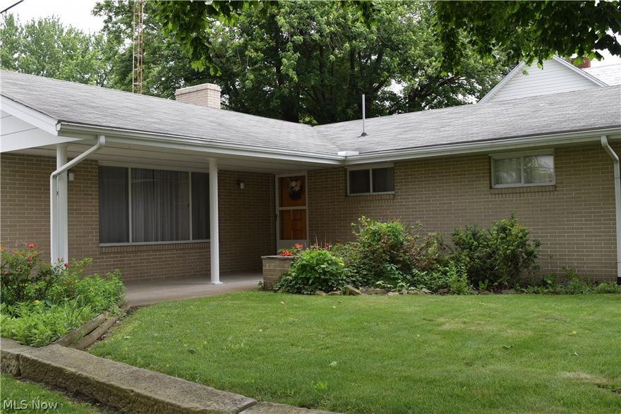 Move in ready is this beautifully landscaped corner lot quality brick ranch.  In town convenience, 3 bedrooms, large eat in kitchen/dining, spacious rooms, office area located just off the living room with a built in desk and shelving unit, fireplace in the recreation room, attached brick carport, large potting/storage shed in the treed yard. Must see soon! HOME WARRANTY