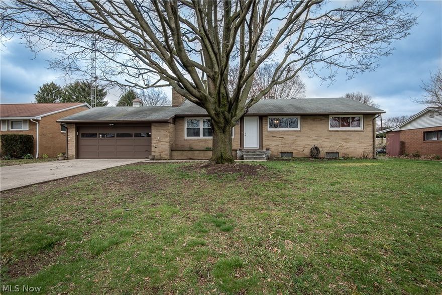 ALL BRICK RANCH IN PLAIN LOCAL SCHOOLS!  This affordable home has so much to offer with over 1200 square feet on the main level plus a partially finished lower level.  The inviting living room has hardwood flooring, wood burning fireplace with brick surround and built-in display ledges.  New tile flooring compliments the kitchen with patio door access to the deck.  The master bedroom includes an en-suite half bath with new vanity and tile floor.  The other two bedrooms offer double closets and share the upgraded full bath with spacious built-in storage and there's more linen storage in the hall.  The partially finished lower level adds a great entertaining space with sitting area that includes a 2nd fireplace and a rec room with cabinets for storage and display. Another shower in the laundry area is an added bonus!  Enjoy views of the fully fenced backyard from the deck or the screened porch with access to the 2 car garage.  Updates already completed include bathrooms, tile flooring, d