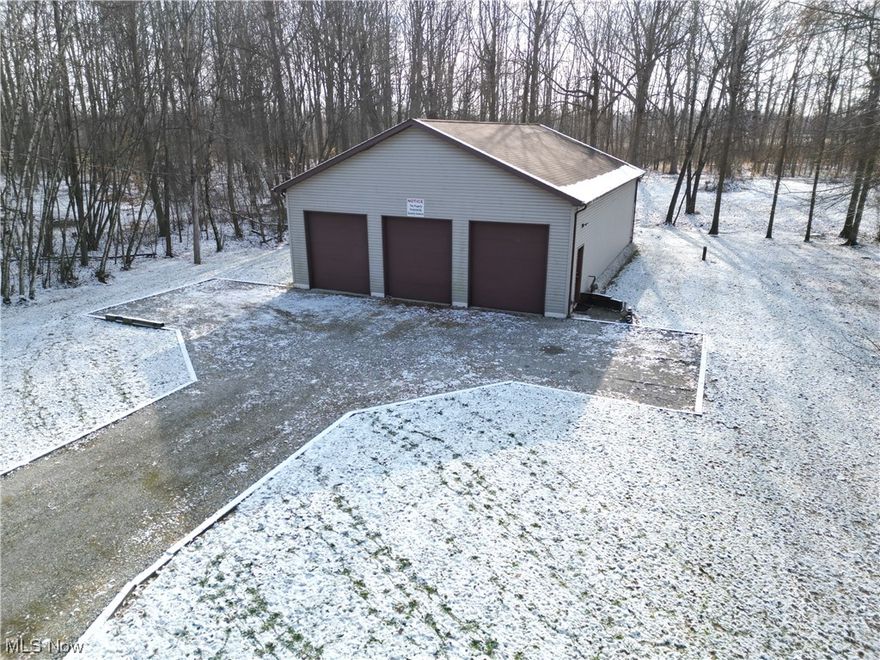 Welcome to this exceptional property featuring a spacious and versatile 3-bay garage, measuring an impressive 36x50 feet. This well-designed garage space is not just a place to park your vehicles; it's a haven for car enthusiasts, DIY enthusiasts, and those in need of ample storage. Perfect for housing your cherished vehicles and keeping them in pristine condition. The building sits on a 80 x 125 lot. It is has a well and a roughed in full bathroom. Also gas radiant heat and a 200 amp electric service. Don't miss the opportunity to make this versatile space your own!