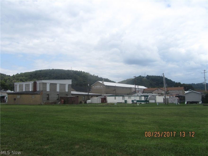 Rare opportunity to purchase this operating mobile home park.  Currently 7 spaces occupied, although designed for 10 spaces, 3 have been vacant for in excess of 6 months.  Also included is a rented garage-warehouse space with total rents being $1675 per month. Community water and sewer, one meter, landlord pays.  Most of the tenants are long term, some as long as 20 years and seller desires it to remain as a mobile home court.