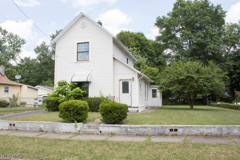 A great investment opportunity in Akron! This 3 bedroom, 1 bathroom colonial needs some TLC and it will make for a wonderful home or rental property! It's located close to Highland Square, with a detached 2 car garage and large side yard. There is an enclosed porch on the front and back entryway, and plenty of living space! Call for your private showing today!