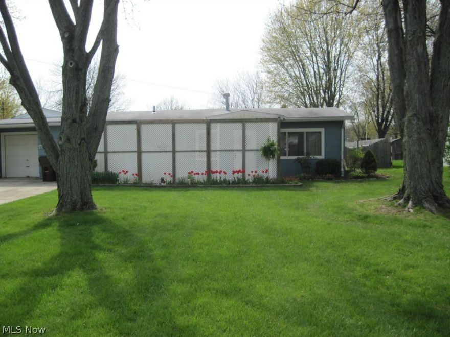 Pride of ownership evident throughout this 2 bedroom ranch home.   From the new Pergo flooring in the eat-in kitchen to the freshly painted rooms throughout , this house is ready for you to move right in!  Galley kitchen loaded with ample cabinets and counter space.  Nice sized fenced-in backyard offers plenty of space for entertaining.  Patio has roll-out awning that provides nice shade for outside enjoyment.  Two sheds offer plenty of storage for all of your lawn equipment. Working well in the back yard for outside watering. Can be converted back to a 3 bedroom house.