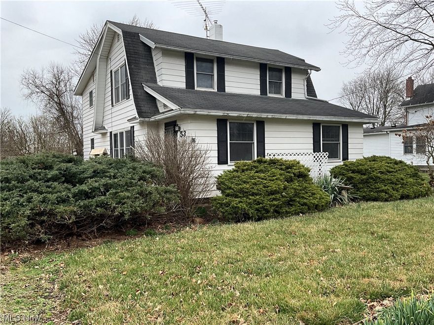 Nice 4 BR, 2 full bath, 2 story home close to downtown, the school &  library.  Basement, 2 car detached garage, Generac standby generator, fenced back yard.  Some nice hardwood floors & natural woodwork.  Updated electric & gas hot water heat.