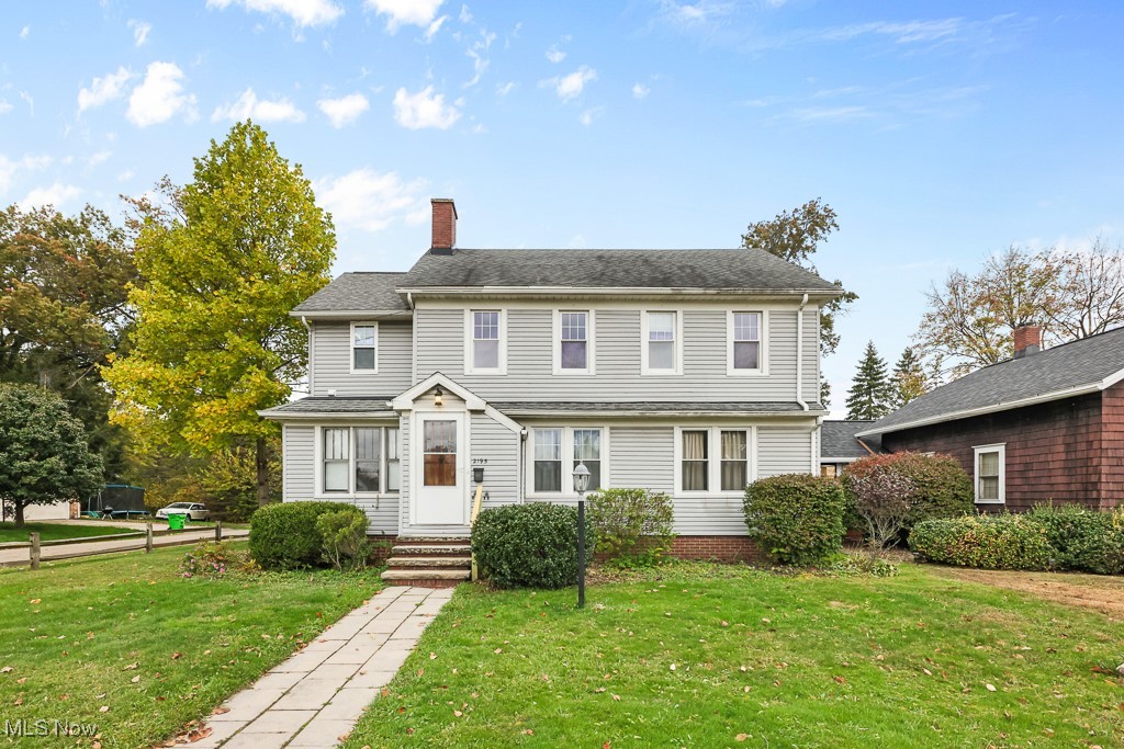 This cherished two-story family home, lovingly maintained by the same family for many years, is ready for its next chapter. Full of potential, this home is situated on a desirable corner lot in a pleasant neighborhood, the residence offers a fantastic layout and an abundance of functional spaces. The main floor features a large living room with gas fireplace, dining area, kitchen with plenty of storage, and a comfortable den that opens to a wonderful screened-in porch, perfect for enjoying quiet mornings or evening relaxation. This home offers three bedrooms, 2.5 baths, and the added luxury of a laundry room and sitting area on the second floor. The versatile floorplan also includes a possible fourth bedroom, ideal for a growing family or dedicated workspace. Numerous updates, such as a new refrigerator, HVAC, hot water heater, and newer windows, offer modern comfort. Storage is plentiful with a single-car attached garage, a second garage, a full basement, and a spacious attic. This home offers the perfect blend of decades of charm and updated features.