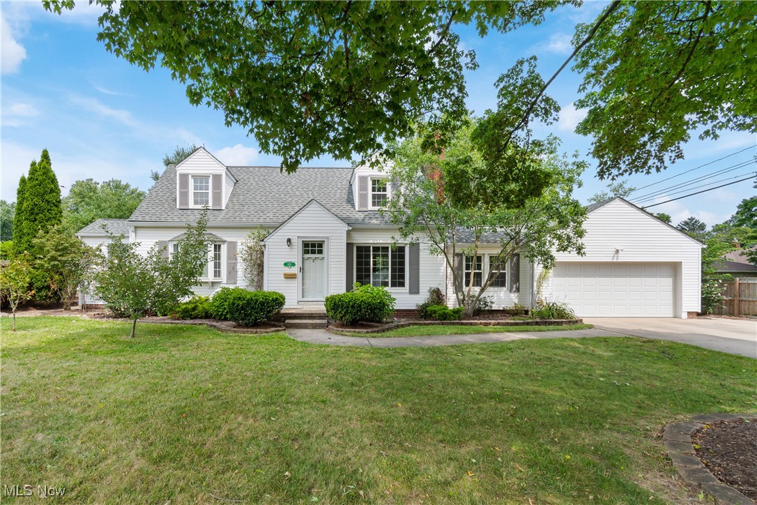 Welcome to this completely updated cape cod style home located in desirable West Akron locale. This interior of this lovely home has been recently renovated and looks amazing. This inviting above offers four nicely sized bedrooms and two full bathrooms. Upon entry you walk into the living room with refinished natural hardwood flooring and a fireplace. The eat-in kitchen boasts oak cabinetry and stainless steel appliances. The dining room is located off the the kitchen. There is a first floor primary bedroom complete with a spacious walk in closet. The second bedroom is spacious and offers great space. The second floor has two more bedrooms with vaulted ceilings and the second full bathroom. The lower level is finished and offers more living space. There is a rec room perfect and an additional room that could be used for an office. The backyard is like a private retreat with lush landscaping. It is completely fenced and has a spacious deck which is wonderful for your morning coffee. All of this plus a two car attached garage. This home has been lovingly maintained and is awaiting a new owner. Some recent updates include roof in approximately 2019, garage door and opener in 2020 and the windows in approximately 2016. There is nothing to do except unpack and enjoy! Call to schedule a showing today to make this your new address!!