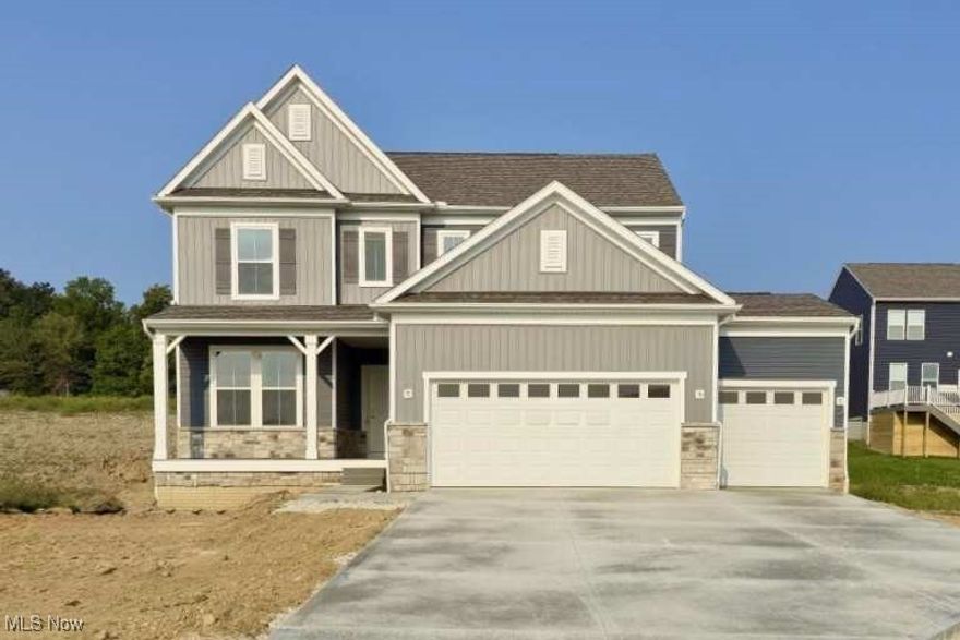 Welcome to your dream home in Wadsworth! This beautiful farmhouse-style residence perfectly blends modern elegance with community charm, making it an ideal place to call home. As you enter, a spacious foyer with two-tone paint and elegant trim sets a welcoming tone. The great room, perfect for gatherings, features a cozy fireplace and flows seamlessly into the gourmet kitchen. The kitchen boasts 42-inch cabinets, granite countertops, and high-end gas appliances, making it ideal for culinary enthusiasts.  Don’t miss the Pulte Planning Center- the ideal space for day-to-day needs, offering a tidy place for everything!  Unwind in the spa-like primary bath, which includes quartz countertops and a stunning frameless shower. A versatile flex room can serve as an office or playroom, adding to the home's functionality. The second-floor laundry area offers convenience with a utility sink and is located near all four bedrooms, each equipped with a walk-in closet. This home also comes with a Nest Smart Home package, smart door locks, and LED lighting for added modern convenience. Additionally, storage is a breeze with a large basement and a three-car garage with an extension. Embrace the vibrant lifestyle of Wadsworth, complete with sidewalks, local shops, parks, and community events that help neighbors connect. Don’t miss this unique opportunity to own a beautiful home in a wonderful community!  Enjoy the peace of mind from industry leading warranties!