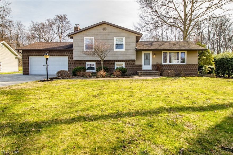 Don't miss your opportunity to see this home! This spacious, updated split-level has been meticulously maintained and is perfect for family and entertaining. with three bedrooms and two bathrooms.  The formal living room is open to the dining area and kitchen that showcases modern appliances and cabinets. The sliding glass doors lead to a sunroom and large backyard. The family room level includes a fireplace, laundry room, and full bath. The basement area offers room for storage, an office, or work room. The sizeable, landscaped backyard has a garden and a storage shed in the back. The home was painted throughout in 2024 along with the 2nd floor flooring.  1 year home warranty provided by sellers from American Preferred home warranty!