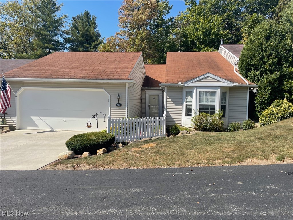 Welcome to this pristine totally handicapped accessible ranch condo in Shady Hollow. A spacious entrance hall welcomes you which leads to a great room with vaulted ceilings, skylights, and a gas fireplace. The dining area is open to the great room. The fully applianced kitchen offers a breakfast bar and newer appliances. Conveniently located behind the kitchen space is a laundry area where both washer and dryer remain. A charming, cozy family room is tucked away off the kitchen and is a perfect spot to read and relax. The master bedroom is spacious with a walk-in closet and bayed winder; the master bath has a double vanity, garden tub, and separate shower. The second bedroom on the opposite side of the house also has a walk -in closet. Enjoy warm weather days on the private courtyard. This property is completely handicapped accessible with a ramp from the garage into the home and a ramp to the back courtyard. All doorways are wide enough to accommodate a wheelchair. Improvements include a new furnace and central air, (3/5/2025) and a new hot water heater, (u/2025). Entire condo has been freshly painted and all new carpet throughout except for the second bedroom.