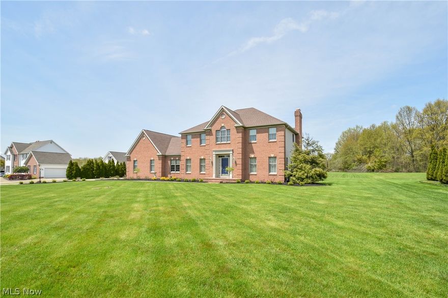 Welcome Home to 5920 Whispering Meadows! This stunning Canfield 4/5 bedroom 3 1/2 bath home is waiting for you. Impeccably maintained, this gorgeous 2 story features the finest upgrades and incredible attention to detail. Spectacular Grand Entrance welcomes you into the open foyer where you notice 9 foot ceilings throughout the first floor. Formal Living Room with French Doors to the Family Room and a lovely Formal Dining Room with a beautiful tray ceiling invite you in to the rest of the home. Family Room features a magnificent gas fireplace with open floor plan into the amazing Kitchen. Renovated in December 2015 the kitchen features gorgeous Granite counters, ceramic (wood look) flooring, stainless appliances that remain with the home, center island and over sized eating area. First floor Bedroom/Office with a full bath across the hall, a laundry room with storage and a wash tub complete the 1st floor. The second floor features a Master Suite with double walk in closets an En Suite