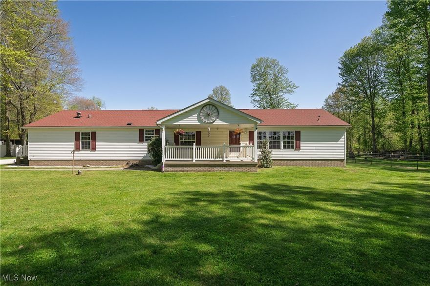Welcome to your dream country escape at 8541 Lee Road in beautiful Malvern, Ohio — a one-of-a-kind equestrian haven nestled on 4 serene acres. This charming 3-bedroom, 3-bath home offers the perfect blend of rural tranquility and practical luxury, tailor-made for horse lovers, hobbyists, or anyone craving space to breathe.

Step inside to discover a warm, inviting interior with natural light pouring through large windows, offering picturesque views of your rolling private lot. The open-concept layout features a spacious living area, a well-equipped kitchen perfect for entertaining, and a cozy dining space where rustic charm meets modern convenience. Each of the three bedrooms is generously sized, with the primary suite offering a peaceful retreat, complete with its own his and hers ensuite bath and walk in closet.

Outside, this property truly shines. Equestrians will fall in love with the 30x30 three-stall horse stable, thoughtfully designed with comfort and functionality in mind. Whether you're training, riding, or simply enjoying time with your horses, you'll appreciate every detail. A 20x20 outbuilding with a sawdust bay adds even more utility, making it ideal for storage or workshop space.

The massive 8-car garage is a rare find — perfect for car enthusiasts, equipment storage, or creating your dream workspace. The entire property is tucked away on a dreamy, wooded lot, providing unmatched privacy, gentle breezes, and the peaceful soundtrack of nature.

With wide-open skies, room to roam, and everything you need to live your country dream, this property is more than a home — it's a lifestyle. Whether you're saddling up, tinkering in the garage, or simply enjoying a sunset from your porch, 8541 Lee Rd is your little piece of paradise. Call your favorite agent for a private showing!