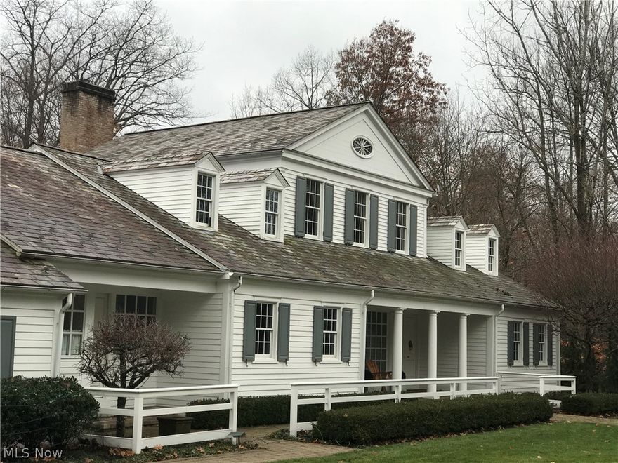 The deal of the Century. Owners say sell this beautiful home to someone who will enjoy it. One of Polands most prestigious addresses. An Architecturally significant home, presents a rare opportunity to the buyer. This is the first time this home has been on the market since being built and it is priced hundreds of thousands below replacement cost. This quality home with its slate roof, copper gutters and other high end finishes was built by Jim Dunlap Construction. Enter through the front door by way of the covered front porch to a beautiful winding staircase. It boast a large dining and living room with fireplace, and heavy crown moldings, for entertaining. A solarium sits right off the living room for a more casual atmosphere. Step out of this room to the trellis covered outside paver patios, built in natural gas grill and full fireplace. The master bedroom, with its numerous closets and large master bath with walk in shower, sits off of the front entry right next to the study, with