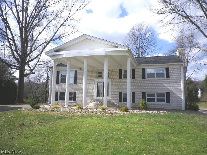 Striking curb appeal for 1937 Birkdale in Green! A circular drive with a port-a-co, set on a cul-de-sac, for this totally updated 3000+ sq ft brick and vinyl home! Spacious and bright kitchen with granite countertops, stainless steel appliances, skylight, and sliding glass door to a newer deck. Formal living room with a wood burning fireplace opens to the dining room. 3 bedrooms and 2 full baths, includes the master suite, complete the main floor. The lower level offers 4th bedroom, 3rd full bath, and a family room, and access to the newer, huge, stamped concrete patio.  Great back yard!
Roof 2015, HVAC 2015, newer plumbing, newer dishwasher, and  newer flooring through out.