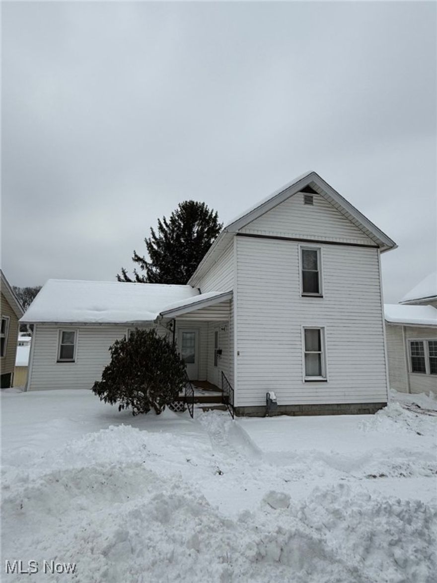 2 bedroom, 1 bath home with a 3- car detached garage is now available. This home is ready for you to make your own whether you are a first time home owner or investor, with a little bit of work this home can be perfect for you. The home features 2 living areas on the main floor along with the kitchen and full bath with a seperate laundry area. Upstairs you will find 2 large bedrooms with plenty of storage. Step out the back door you can enjoy privacy on your screened in porch overlooking a private backyard and 3 car detached garage. All appliances will convey to the new owners.  Call today to schedule a private showing.