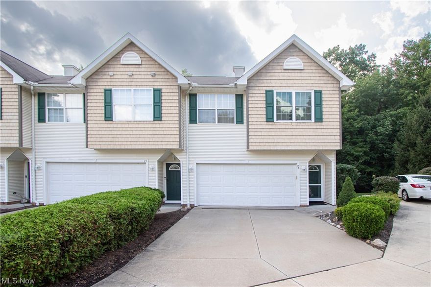 Welcome to this spacious move-in ready Reserves of Aurora town house! This end unit condo is equipped with 3 bedrooms, 2 full baths, 1 half bath, an attached 2 car garage and fabulous, sought-after open floor plan design. The great room has a cozy gas fireplace, vaulted ceilings with sky light, and sliding glass doors that lead to one of 2 private decks that are surrounded by beautiful, wooded views. The kitchen includes plenty of cabinet and counter space, all appliances, a pantry, and countertop bar seating open to the great room. Down the hall you will find the main floor laundry, 2 bedrooms, one being the primary bedroom with full en suite bathroom and large closet. The 2nd bedroom has a large closet and the 2nd full bath directly outside in the hallway. On the lower level you will find a large versitile room that could be used for many purposes. It has an attached half bathroom and sliding glass doors that lead to the second deck and would make a lovely family room, office or ente