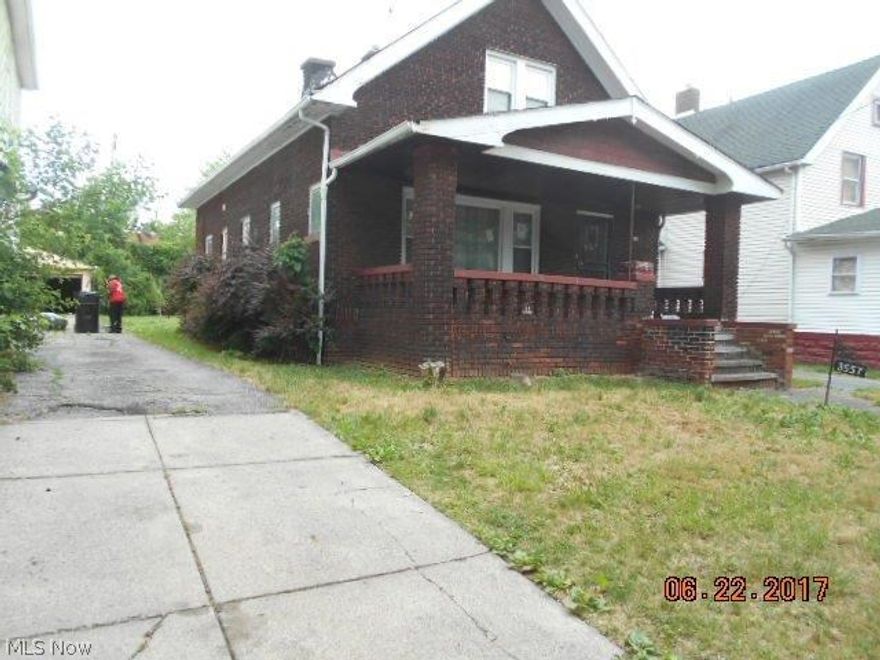 Great brick bungalow with loads of potential with a little TLC. Great rental and/or starter home. Near amenities. Selling "as-is", seller to make no repairs, no warranties. No utilities will be turned on! City of Cleveland states house is CONDEMNED. Check with Cleveland Building dept on what the specific requirements to move forward with a purchase/comply with city requirements. VIOLATIONS ATTACHED!!