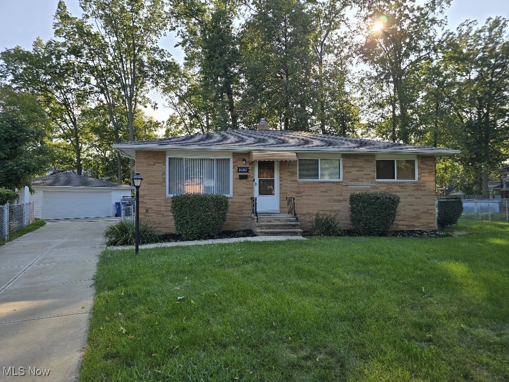 Wow! Fabulous All-Brick Ranch For Lease! Perfectly suited for comfortable living and Ready Today! This single-level residence offers a smart, open layout and all the essentials for easy day-to-day living. Step inside to find a large living area with plenty of natural light throughout. You will love the dazzling newly Refinished Original Hardwood Floors throughout! The kitchen features spectacular solid-wood kitchen cabinets with plenty of counter space to enjoy or to room to cook up a storm! Stainless Steel Appliances are newer and include a Range/Oven, Built-in Microwave, Refrigerator and Dishwasher, too! A few steps from this Kitchen are Three (3) Bedrooms and a FULL Bath. The Master Bedroom boasts a private half bath, with Granite Countertops! Generous closet storage! Newer concrete driveway with ample parking! Two-car attached Garage! You’ll love the Generous Lower Level Rec Room, Workshop/Storage area and Laundry with Washer and Dryer, also included to make this Home a Dream! Out back, enjoy a LARGE Deck and fully fenced-in yard, perfect for relaxing evenings outdoors! Schedule your tour today! It’s SO EZ2C!