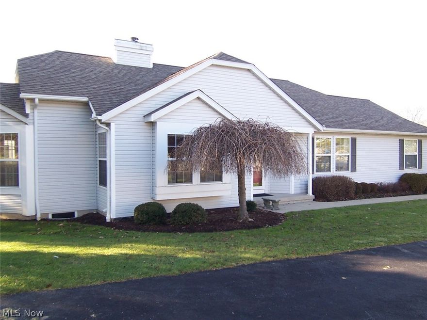 Beautifully maintained and neutral condo at popular Woodbury! It is an expanded Ashley, adding two additional feet to the whole width of the unit including the garage! The Foyer entry leads to the vaulted living room with a gas fireplace and a formal dining area. The kitchen boasts white cabinets, Brazilian cherry wood floors, and a breakfast bar. There is a beautiful newer deck accessed from the dining area. The vaulted master bedroom is very spacious accommodating king-size furniture and includes a sitting area. There are two closets - one of them a walk-in closet! The master bath is very spacious and includes a newer commode. The 2nd bedroom is also very large, and the main bath is just across the hall making it a perfect guest bedroom! There is a 1st floor laundry with a closet and laundry sink. The huge unfinished basement, plumbed for a bath, could be finished with much additional living space, and great storage! The H2O was replaced in 2015. This condo is close to shopping, rest