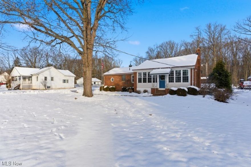 Experience the perfect blend of classic charm and modern convenience in this beautifully remodeled home. Every aspect has been thoughtfully updated, including the kitchen, bathrooms, flooring, lighting, and fresh paint throughout, creating a stylish, comfortable, and inviting atmosphere. Step into the light-filled sunporch at the front entry, featuring three walls of windows that welcome you inside. The cozy Living Room boasts a gas fireplace, recessed accent lighting, fresh paint, and a wide-screen TV mounted above the fireplace—making it an ideal space to relax and unwind. The galley style updated Kitchen features ss appliances, hard surface (cultured granite) and butcher block countertops, white cabinetry, and ample storage. Entertaining your family and friends is effortless with the adjoining Dining Room and discreet Half Lav. The first floor offers three Bedrooms and a Full Bathroom with a tub/shower combination. Off the back hallway, you'll find access to the attached one-car Garage and a full, unfinished lower Level with storage, mechanicals and washer/dryer. Outside, enjoy a generous backyard on a 2.48-acre lot (100 x 1083 ft)-perfect for entertaining or relaxing by the built-in firepit under the stars. The thoughtfully landscaped grounds are ideal for gardening, play, and relaxation, while the inviting patio is perfect for weekend barbecues or morning coffee.
Additional features include a 5-6 car garage for car enthusiasts, hobbies, or a workshop, as well as a large storage shed for versatile use. With numerous updates completed, and being located in Solon, a top-rated school district, convenient shopping and restaurants, this move-in-ready home is prepared for its next chapter with you!