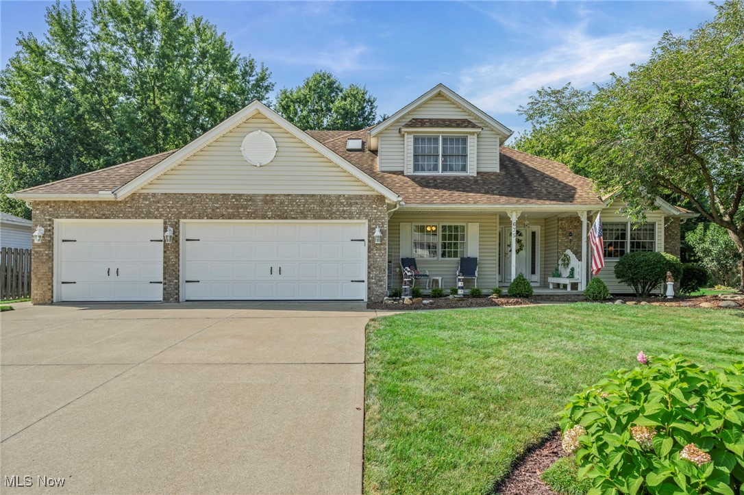Welcome to 675 Juniper Lane – a beautifully maintained Colonial residence, lovingly cared for by its original owner. This 4 bedroom, 2.5 bath, 2169 sq. ft. home offers timeless charm, modern updates, and a peaceful neighborhood setting with no HOA. From the inviting covered front porch, step into a warm foyer that leads to a versatile dining room or private home office. The cozy living room, featuring a vaulted ceiling and gas fireplace, is the perfect gathering spot for family and friends. The spacious eat-in
kitchen is a true centerpiece, boasting granite counter tops, two pantries, stainless steel appliances, abundant cabinetry, and natural light that creates a cheerful start to your day. The main level master bedroom en suite impresses with a walk in closet, linen cabinet, vanity, separate glass shower, a luxurious Jacuzzi tub and a private water closet. A convenient half bath and laundry room with washer, dryer, utility sink, and storage closet complete the first floor. Upstairs, you’ll find three generously sized bedrooms with ample closet space, a full bath, and a charming skylight sitting area-perfect for reading or stargazing. Step
through the sliding glass doors on the main floor to a covered back deck with nature stone flooring, a private backyard, storage shed, and cozy fire pit for relaxing evenings. The finished basement offers a large rec room, abundant storage, an additional office or potential bedroom and a workshop for all your projects. The attached 3-car garage features epoxy flooring, full wall cabinetry, and a triple-wide driveway for extra parking. Additional highlights include ceiling fans in every room, Pergo flooring throughout and
beautifully landscaped garden beds. Don’t miss your chance to own this move in ready gem – schedule your tour today!!