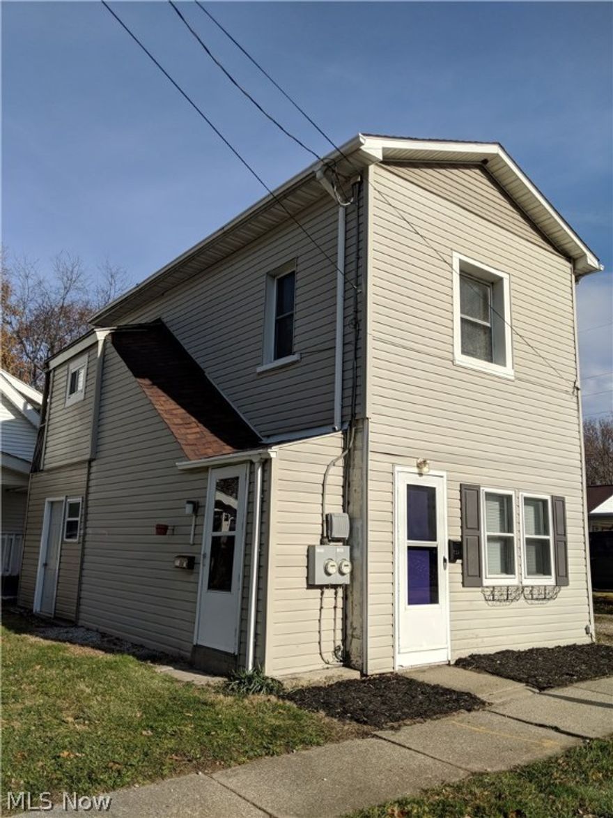 Great Investment! This charming and renovated multi-family property has two units, each are STUDIO units (no separate bedroom) with combined Living Space as Living Room and Bedroom, kitchen on one end and one bathroom with a shower (no bathtub). These cute 1st & 2nd floor separate Studio units have had a complete remodel from ceiling to floor just about 3 years ago and just had paint freshened between residents! Remodel included new kitchen with all new new appliances, new bath, new lighting, and gorgeous plank laminate flooring. These are all electric with tenant paying electric and water (heat is electric so tenant pays for heat) with landlord paying 1-$33 monthly City sewer/trash/recycle bill as well as yard & plowing. Residential or live in work space since it is also zoned commercial use. Unit #1 also has the access to the basement level and Unit #2 has a locked storage area under the stairs for storage. It is located in Cuyahoga Falls convenient to highways, grocery stores and re