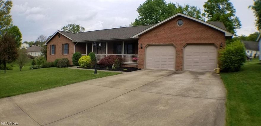 Custom built with Amish woodwork, and well maintained. Beautiful cul-de-sac location overlooking large green space woods and a pond view. Full finished mother-in-law suite, Studio style, in the walk-out lower level, offering a full kitchen, walk-in closet, Full bath, and patio. Sit on the large front porch and enjoy the large front yard, or cookout on the back porch, overlooking the gorgeous view of the trees and pond. This home offers a glassed 3 season room off the laundry room with sliding doors that walks out to the back and side yard. Lots of space, most beautiful home in the neighborhood with lg closet storage, and just waiting for your personal touch. Make this your home today. Public Water and Sewer. Large Storage Shed. Lg Driveway-extra off-street pkg. Fin. BSMNT not inc in SQ ft.