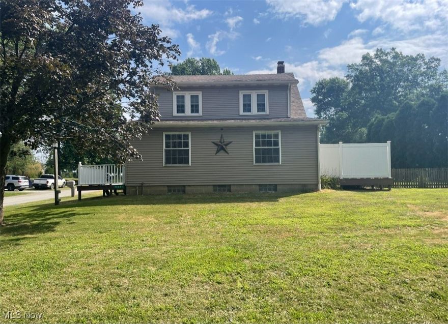 Really clean 3 bedroom 2 bath 2 story vinyl sided home. Enclosed sun room. Laminate and hardwood floors throughout. Large eat in kitchen with all appliances. Utility room with washer and dryer. Replacement windows. Central Air. Ceiling fans throughout. Full basement. Private deck. Side porch. Fenced in yard. Large 2 1/2 garage plus big RV garage 35x24. Plenty more. Call now