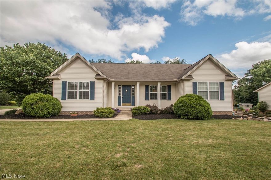 This one-owner, well-cared-for sprawling 4 Bed, 3 FULL bath raised ranch w/ walk-out is located just off Rt. 261, yet on a double dead end, providing a private wooded setting! LOCATION, LOCATION, LOCATION...Close to Kent, Tallmadge, KSU, shopping, & hikeNbike trail @ Middlebury Road! Designed by the owner, one bedroom is set apart from the others as part of a suite. Use the handicap accessible "wing" w/ own garage entry as in-law suite w/ sitting room, kitchenette & full bath OR as a teen's suite w/ hangout space for friends. Either way, it's private & allows independence, yet close enough to keep tabs! Living room w/ wonderful built-ins & brick firebox with woodburner for those chilly nights! GORGEOUS hardwood throughout main living area, office/bedroom, entry & Master Suite. Kitchen sink, situated within an angled island, opens to the living room & eat-in area. AWESOME raised rear expansive porch/deck off of eat-in area provides serenity & a gorgeous view of a park-like wooded back y