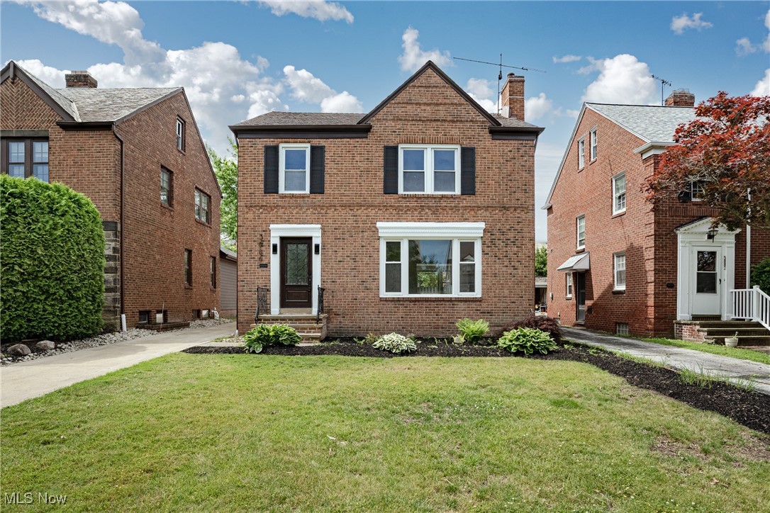 Welcome to 3886 Faversham Rd – A Stylishly Updated Colonial in the Heart of University Heights! This beautifully renovated 3-bedroom, 1.5-bath home offers the perfect blend of timeless charm and modern updates. Step inside to discover fresh neutral paint throughout and a bright, inviting floor plan. The spacious living room boasts gleaming hardwood floors, abundant natural light, and a striking fireplace with a stone accent wall—perfect for relaxing or entertaining. The formal dining room flows seamlessly from the living space and features a classic built-in china cabinet and hardwood flooring. Just beyond, you'll find a cozy family room with brand new carpet and wraparound windows that bring in the sunshine. The fully renovated kitchen is a showstopper with quartz countertops, stainless steel appliances, refinished cabinetry, tile backsplash and flooring, plus a charming eat-in nook. A renovated half bath and an enclosed back porch complete the first floor. Upstairs, all three bedrooms are generously sized with beautiful hardwood floors, including a spacious primary bedroom with dual closets. The fully updated full bath features modern fixtures and stylish finishes. The lower level includes a finished rec room with luxury vinyl plank flooring, a second fireplace, and classic wood paneling—perfect for a media room, play area, or home office. A freshly painted laundry and utility area includes the washer and dryer for added convenience. Enjoy the outdoors in the partially fenced backyard, ideal for pets or gardening. This home is truly move-in ready with updates in all the right places—don’t miss your chance to call it home!