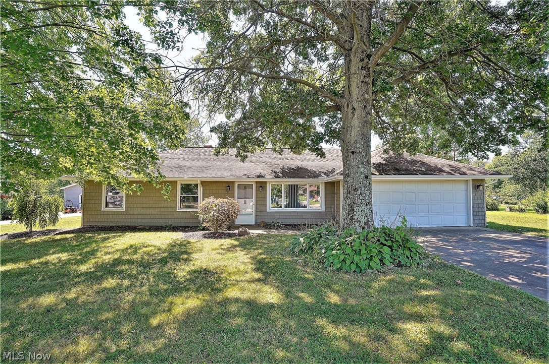 Welcome home to this fabulous, updated (2022) three-bedroom, one full bath ranch home. Yes, all updated! Come on into this beautiful, bright all open living room and dining room that offers a new slider door to the back patio where you can sit out and enjoy looking at the beautiful, wooded lot. All new lighting, ceiling fans, recently painted and new flooring throughout this stunning home. The gorgeous and bright kitchen has abundant of new cabinets, counters, new plumbing, sink, and new appliances including built in microwave. WOW! There are three bedrooms, and an updated full bathroom offering a new vanity, shower, lights, and toilet. Two car attached garage. HVAC, A/C, Furnace, ducts, siding are all new. New roof (2022), and well serviced (2022). Nothing to do but move right in! Precious memories begin right here!