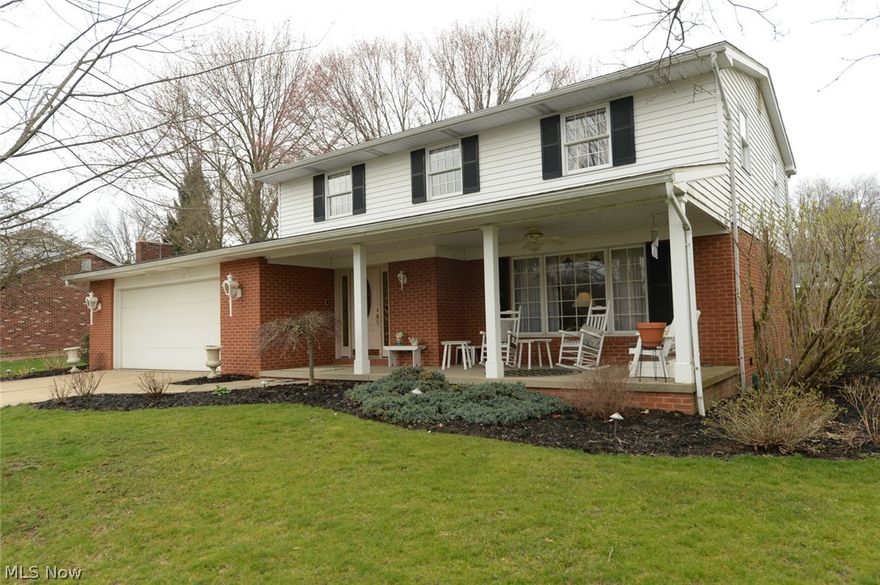 Walking up to this beautiful, well cared for homea with alittle over 2900 sqft, ready for its new owners, you'll be welcomed by a large, covered front porch. The porch provides ample seating, a feeling of seclusion and a nice view of the neighborhood. Entering the foyer, the large living room is to the right and flows into the adjacent dining room then around to the kitchen and on to the family room with built-in bookshelves and storage surrounding the gas fireplace. From here you can head outside to the shaded patio, into the half bath off the hall or down the hall to the Foyer and then head upstairs. The beautiful oak railing leads to the 4 bedrooms and two full baths. To the left is the Master bedroom with full bath and walk-in closet. Off the hallway is the main bath and the other 3 bedrooms. Head back down and make your way to the lower level where you will find a fantastic, open entertaining space including a second full kitchen for you to host parties, holiday gatherings or grea