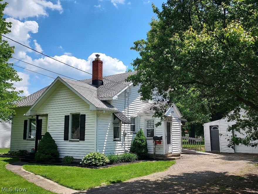 Don't miss out on this cutie! Every room has been beautifully updated. Beautiful and bright updated kitchen and first floor bath. Newly refinished Craftmaid soft close cabinets, new microwave, plus stove, refrigerator and dishwasher all stay. Bath features a new vanity, toilet, flooring and fixtures. Refinished oak hardwood floors, updated windows, water tank approximately 2018. Trane furnace. Bonus room off of kitchen could make a great office and features french doors to covered back patio. Adorable side door mud room with coffee station. Brand new septic installed 2024. Home comes with a 1 year home warranty too!