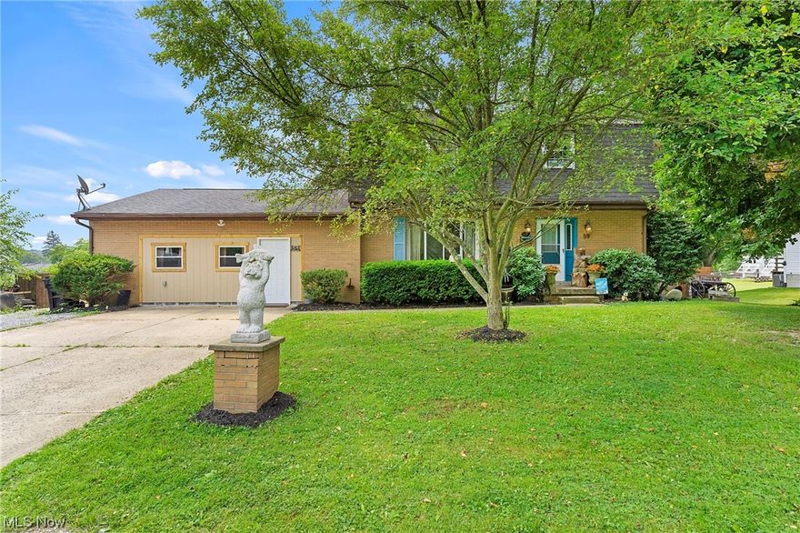 Welcome to your dream home, where charm meets character on a peaceful, low-traffic street! This 3-bedroom brick colonial is bursting with delightful surprises and unique touches that make it truly one-of-a-kind.  The spacious living room boasts a beautiful picture window, welcoming an abundance of natural light and offering a panoramic view of the serene surroundings. It's the ideal spot to unwind, read a book, or simply bask in the beauty of your new home.
The small kitchen may be cozy, but it's designed with efficiency in mind, making meal prep a breeze while adding a dash of creativity to your culinary adventures.Convenience is at its best with the first-floor laundry, making mundane chores a breeze and freeing up more time for cherished moments with family and friends. The converted garage space offers a versatile bonus area, perfect for a home office, playroom, or even an artist's studio. If you're seeking a home that stands out from the crowd, offering a blend of classic appeal