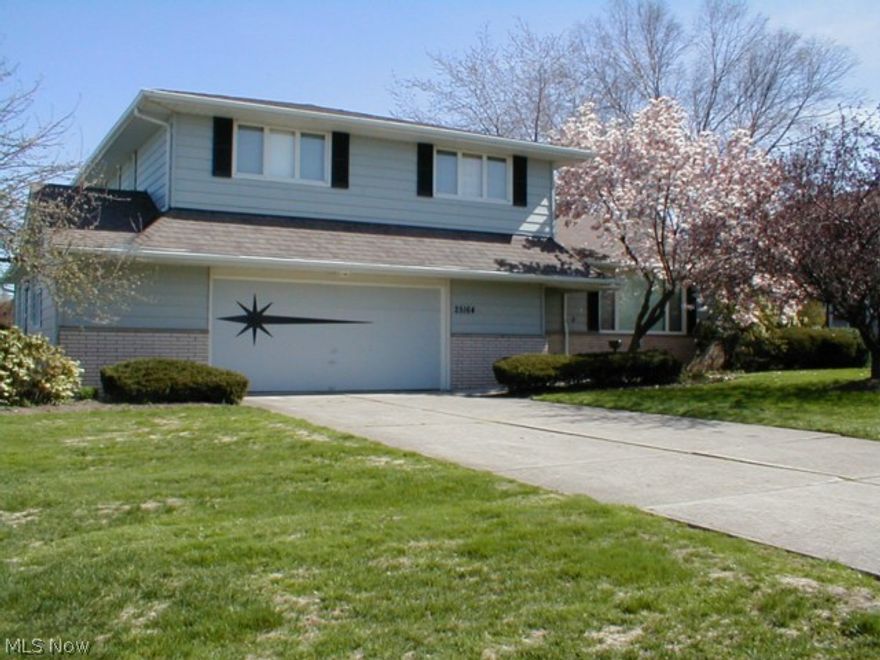 B-E-A-C-H-W-O-O-D!!! Great opportunity to get into a great community!  This large and open floor plan has a fantastic family room addition with gas fireplace, built ins and over-sized windows for tons of natural light.  The kitchen has lots of cabinet space and Corian counter tops.  The large backyard has lots of green space and a large deck with built in planters.  First floor office and laundry. Attached 2.5 car garage.