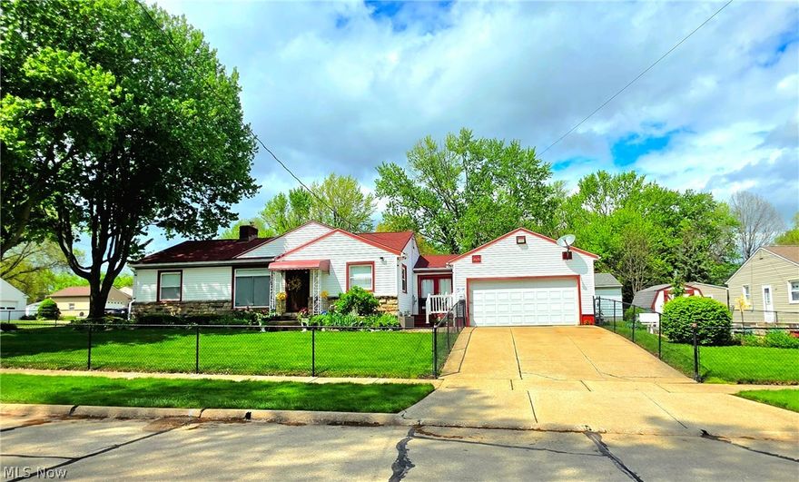 Welcome to 3651 Dick Street. Quality built home in heart of Mogadore.  Walk to Lions Park. 2 car garage with breezway.  whole yard vinyl chain linked fence. Large corner lot. New carpet in living room and bedrooms. Freshly painted interior.  Large recreation room with wet bar. 1/2 bath in basement. Bonus room in basement. New furnace and hot water heater. Shed.