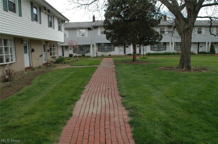 Wow! A FOUR bedroom, 2.1 bath condo?  With low association fee?  You must be dreaming!  All this in Mentor, too?  No! You are not dreaming.  This townhouse even has a 2 car attached garage and a fireplace to boot!  Beautiful curved stairway with wood banister leads up to the bedrooms and 2 full baths.  First floor has a gorgeous fireplace with glass doors.  There is also a family room, dining room, half bath and of course your kitchen with some appliances.  All of this for this low of price? Hurry before your chance runs out!  PS: Window should be replaced by 5/27/16