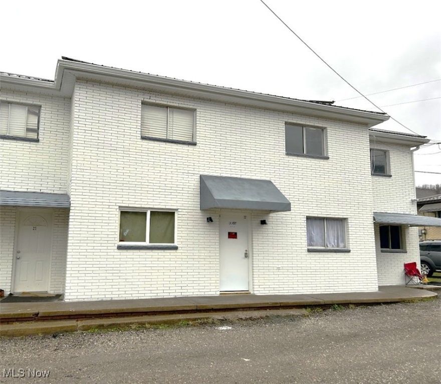 No security deposit needed! As you step inside, you’re immediately greeted by an open floor plan, where the living, sleeping, and dining areas blend seamlessly. The kitchenette, while compact, is thoughtfully designed to maximize efficiency. It comes equipped with essential appliances, including a full-sized refrigerator and stove, making it easy to prepare everything from quick meals to gourmet dishes. The well-placed cabinets offer just enough storage for your cooking essentials, keeping everything organized and within reach. The studio layout is perfect for those who appreciate an open, uncluttered space. There's plenty of room to create a cozy sleeping nook, perhaps with your favorite bed and personal touches, and a designated living area where you can unwind or entertain. Whether you enjoy curling up with a book, hosting a small get-together, or simply relaxing after a long day, this versatile space can easily adapt to suit your needs. The bathroom is conveniently located just off the main living area, providing all the essentials you need. It features a clean and functional design, including a full-sized bathtub and shower combination, perfect for a soothing soak or a quick, refreshing shower. One of the most convenient features of this apartment is the off-street parking, offering you a designated spot for your vehicle. In addition, the building provides a shared laundry facility on-site, so you don’t have to worry about trips to the laundromat. This studio apartment has everything you need for a comfortable and convenient lifestyle. Whether you're enjoying the simplicity of your space or taking advantage of the location's nearby amenities, this charming studio offers a homey retreat for anyone looking to embrace a modern, low-maintenance lifestyle. No HUD. No Pets. No Smoking. There is a flat rate for all utilities of $125 for a total monthly rent cost of $425.