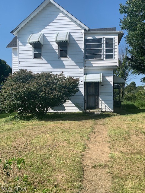 High visabilty and easily rentable duplex on a main street thru Akron's North Hill. In the heart of the International district, these properties rent quickly. Seller purposely did not put tenants in this month as to put it for sale and allow the new owner to make their own choices. With a little TLC and a bit of upgrades, the new buyer could increase the rent dollars. 1 bedroom upstairs has consistently received $600 per month and the 2 bedroom downstairs unit had consistently received $650 per month. Tenants pay ALL utilities. Everything is separate. There is a 2 car garage on the property, but it should be torn down or have some serious repair to it. Buyer to assume all repairs as seller will not make any. Absolutely AS-IS.